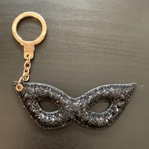 KATE SPADE MASQUERADE MASK KEYCHAIN